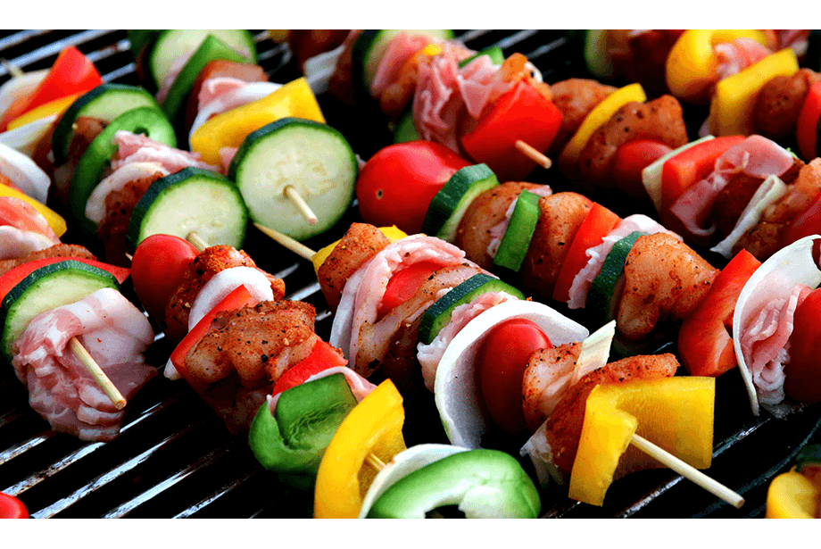 A range of food being cooked on the barbeque, portion planning helps to reduce food waste