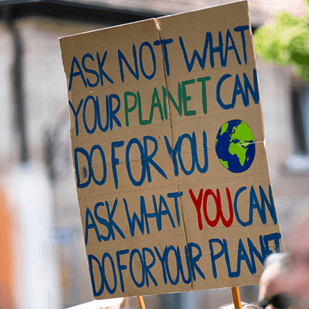 What you can do for your planet placard sign at climate change protest