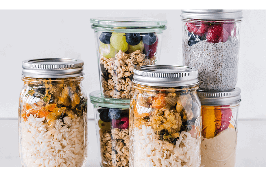 Glass jars containing leftovers help reduce waste. 