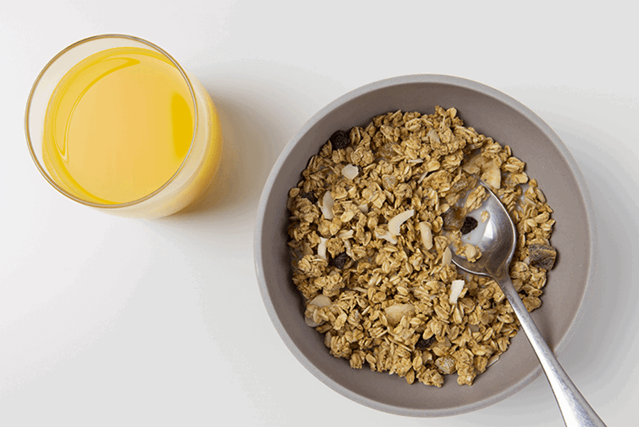 Bowl of cereal and orange juice