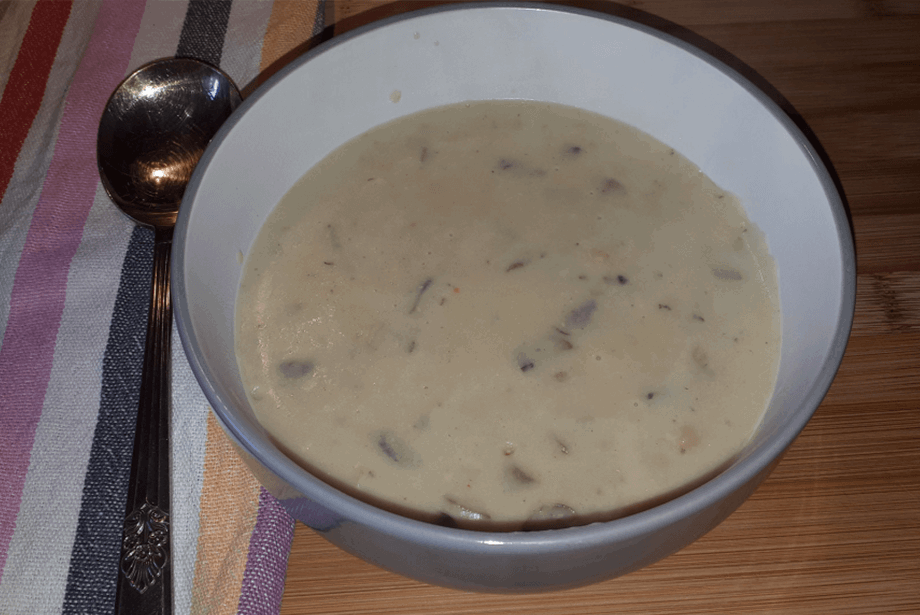 Steaming bowl of mushroom, cannelini and stilton soup