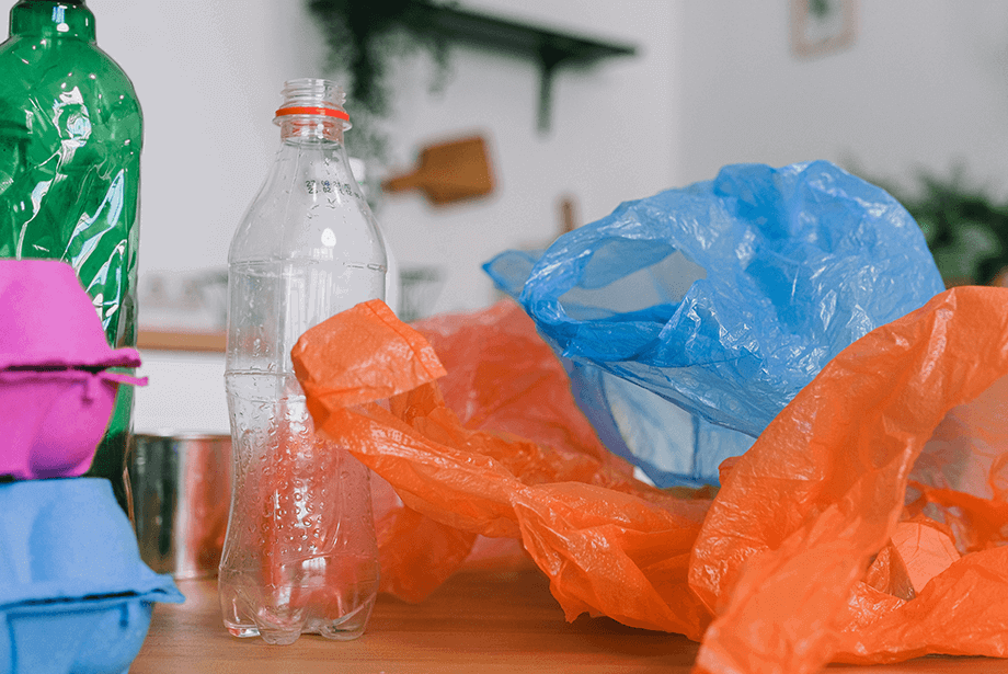 Different types of recycling including plastic bottles, plastic bags and egg boxes 