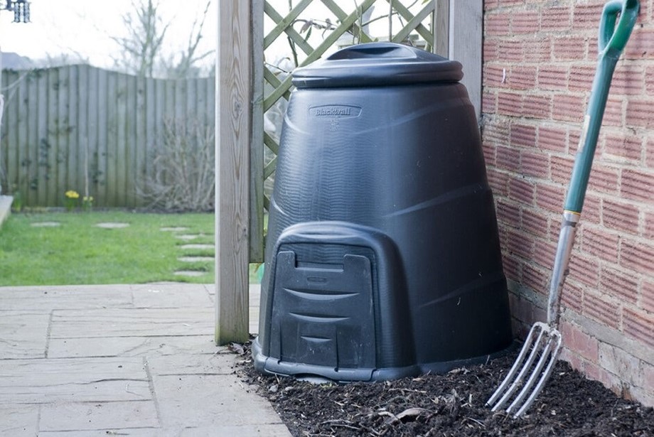 compost bin with garden fork