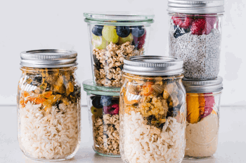 Glass jars containing leftovers help reduce waste. 