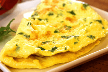 A fluffy omelette on a plate