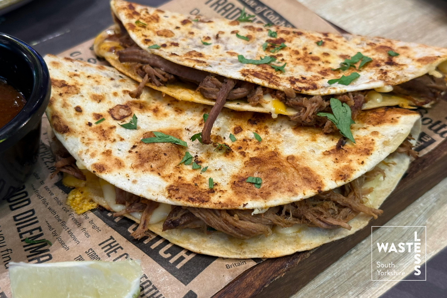 Quesadillas with pulled meat, cheese, coriander and lime.