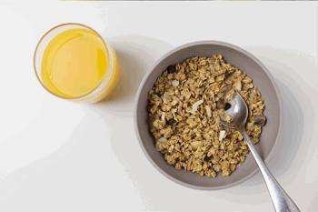 Bowl of cereal and orange juice
